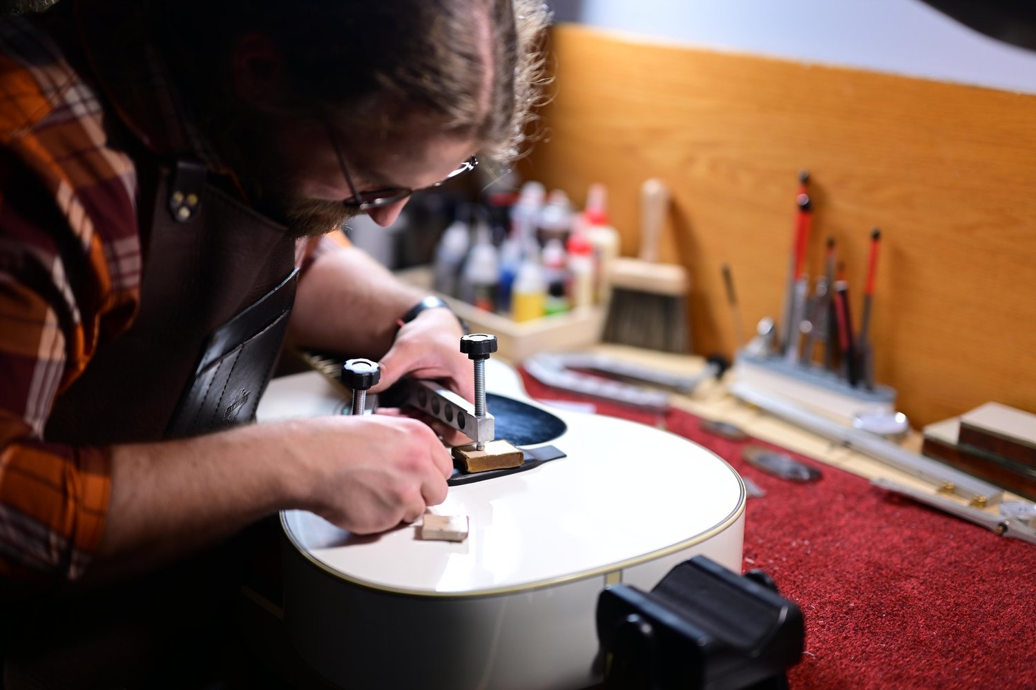 Jonathan Scott working on guitar restoration